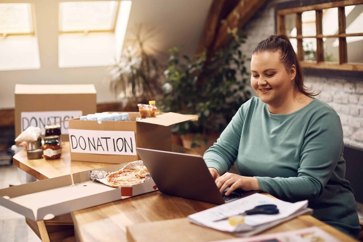 Volunteer working on a laptop